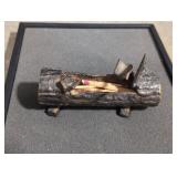 Cast metal match holder log CA 1910