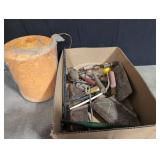 Assortment of tools and large role of baler twine