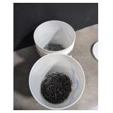 Two gallon pail 1/4 full with 2 1/2' coated