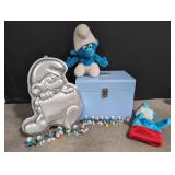 Smurfs in omega lock box with key and cake pan