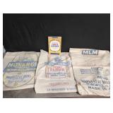 Purity cookbook and 3 Maple Leaf Mills sacks