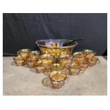 Yellow Carnival glass punch bowl with glasses (