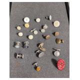 9 single cuff links and 13 single button covers