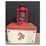 Metal tin 14' w x 10' d x 10' h and red lantern