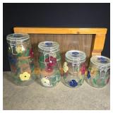Glass jar canisters and wooden tray