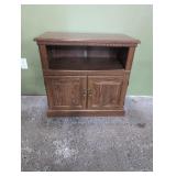Rolling TV cabinet made of particle board 31' w x
