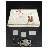 1 metal cigar tin, bread token for Jonason's