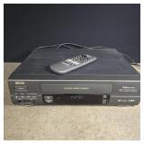 Sears VHS player with remote, powers on