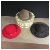 Hat box with fancy felt hats