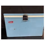 Blue metal Coleman cooler 22' w x 13' d x 13' h