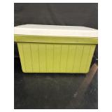 Green plastic Coleman cooler 21' w x 13' d x 13'
