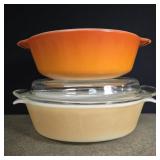 Pyrex covered casserole dish and Fire King orange