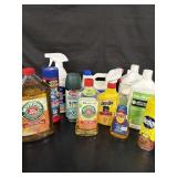 Assorted cleaning supplies, mostly opened