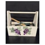 Wooden carry box with garden tools inside