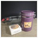 2 clear cake dishes and purple ceramic canister