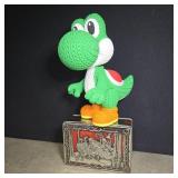 3-D printed 'knitted' Yoshi and vintage metal tin