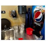 Contents of cabinet including cups