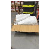 Box of assorted hotel linens, including duvets