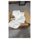 Box of assorted hotel linens, mostly pillowcases