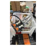 Bin of assorted hardware and other items