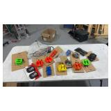 assorted bike parts including pedals grips