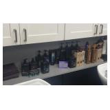 Shelf of assorted hair products some full