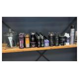 Contents of shelf including truss hair products