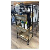 Rolling foot and metal cart with assorted