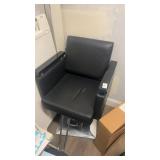 Black leather salon adjustable height chair with