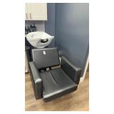 Hair wash station including chair and sink must