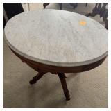 OVAL MARBLE PARLOR TABLE W/ CASTERS