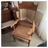 OAK ARM CHAIR W/ CANE SEAT