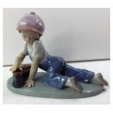 Lladro #7619 ' All Aboard boy with Train