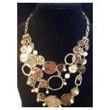 Ladies  three strand necklace with Faux pearls.&