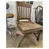 Antique rolling wooden desk chair