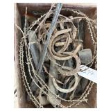 Box of horseshoes & antique tools