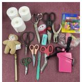 Assorted items including scissors, pencil