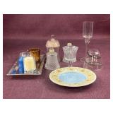 Candle holders and candle trays, one is Yankee
