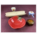 Assorted items including corn holder, egg cup,