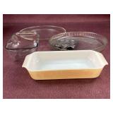 Baking dishes and spoon rest including a fire