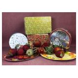 Assorted tins, artificial fruit, plastic serving