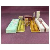 Assorted Vintage Avon candles and perfume, one of