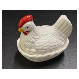 Ceramic Hen on nest, has a crack on the base