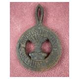 Cast iron trivet, has some rust