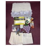 Placemats, scissors, pressing cloth and more