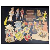 Assorted paper dolls and clothes