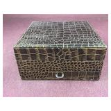 Crocodile-embossed jewelry box featuring a