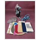 Vintage GE with resting pad, iron on mending