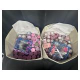 Containers of Revel Dip Nail Powder