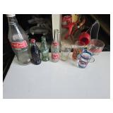 Coca-Cola and Soda Bottles and Glasses